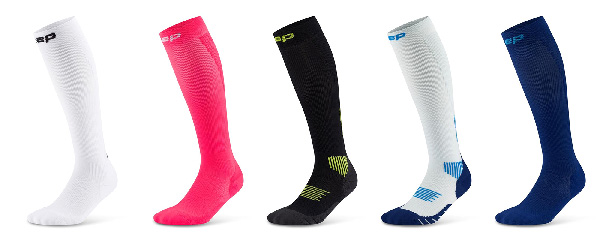 Run Compression Socks showing white, petrol/dark red, pin/black, ocean/petrol, and blue